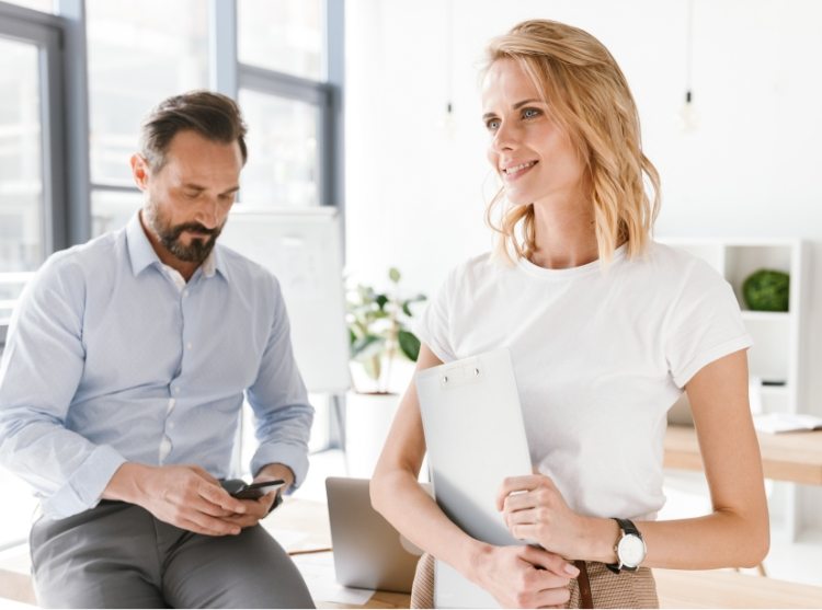 demo-attachment-328-confident-man-manager-using-mobile-phone-PKUB4RV@2x